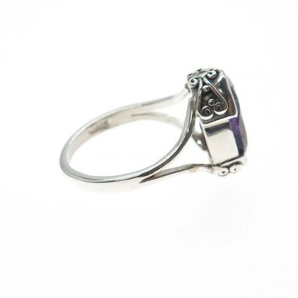 Source Unknown Silver Ring with Deep Purple Oval Gem